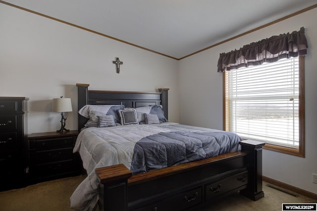 carpeted bedroom with lofted ceiling