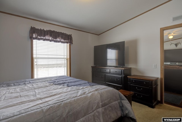 carpeted bedroom featuring lofted ceiling