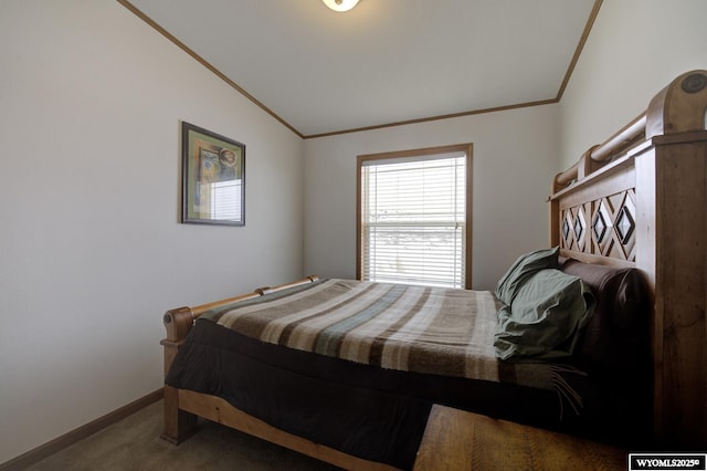 carpeted bedroom with vaulted ceiling