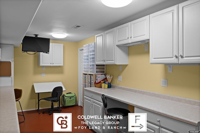 kitchen featuring white cabinetry