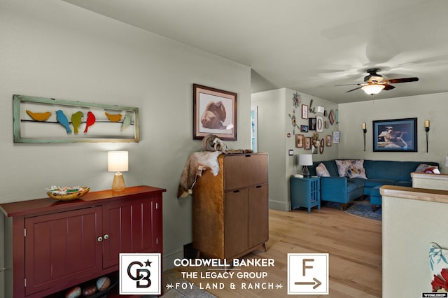 interior space with ceiling fan and light hardwood / wood-style floors