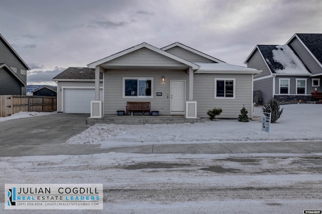 view of front of property featuring a garage