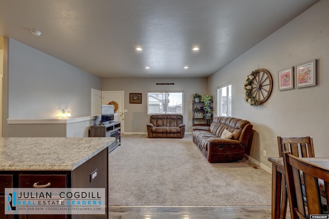 living room with light carpet