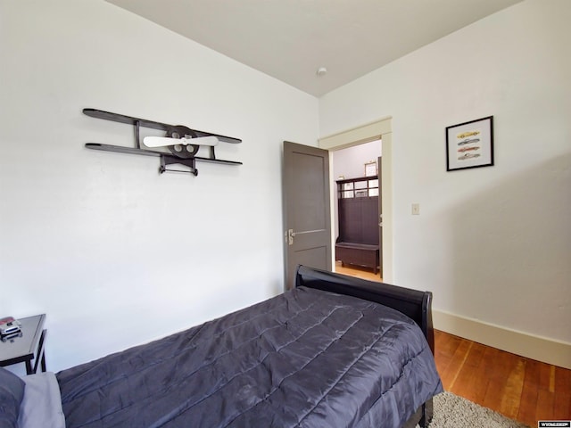 bedroom featuring hardwood / wood-style flooring