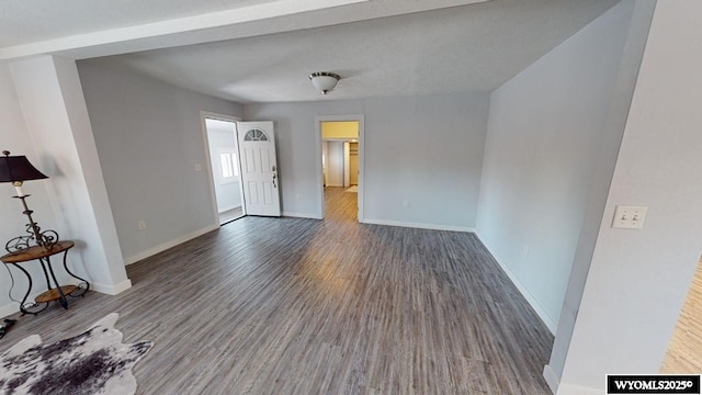 spare room with hardwood / wood-style floors