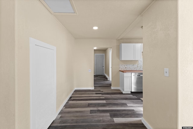 hallway with dark wood-type flooring