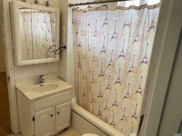 bathroom with vanity and shower / bath combo