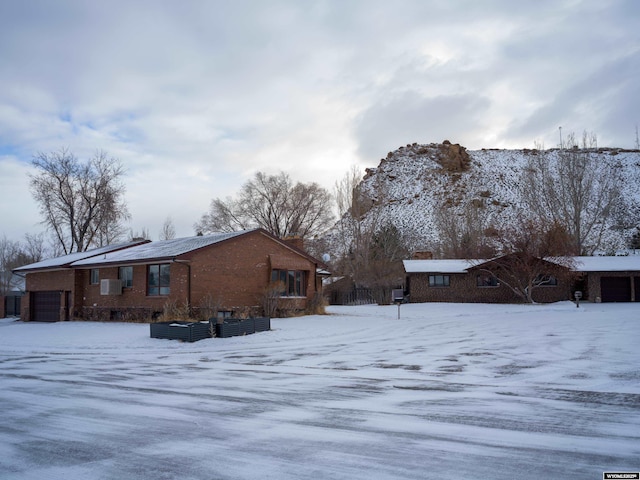 view of snow covered property