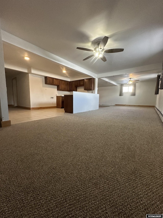 basement featuring ceiling fan and light carpet