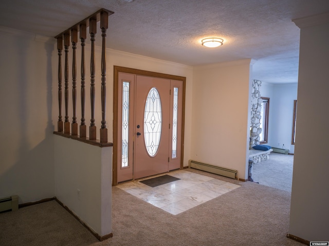 carpeted entryway with a baseboard radiator, a textured ceiling, and crown molding