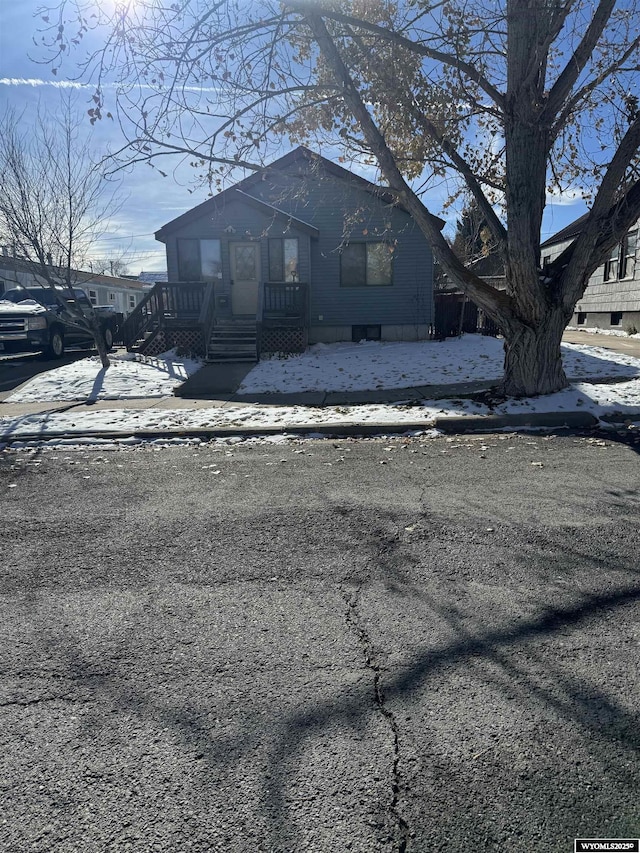 view of front of home with a deck