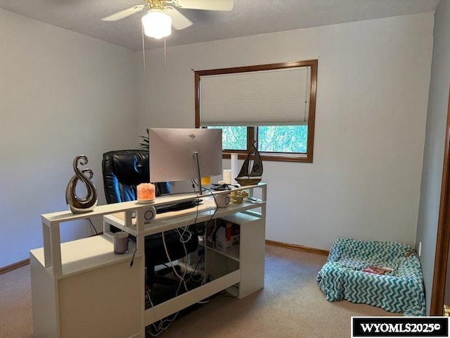 carpeted office with ceiling fan