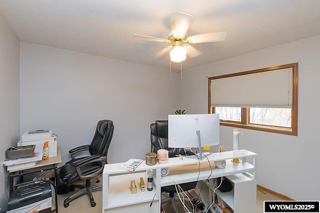 office area featuring carpet floors and ceiling fan