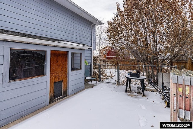 view of snow covered patio