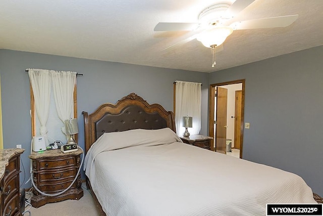 bedroom featuring ceiling fan and carpet flooring