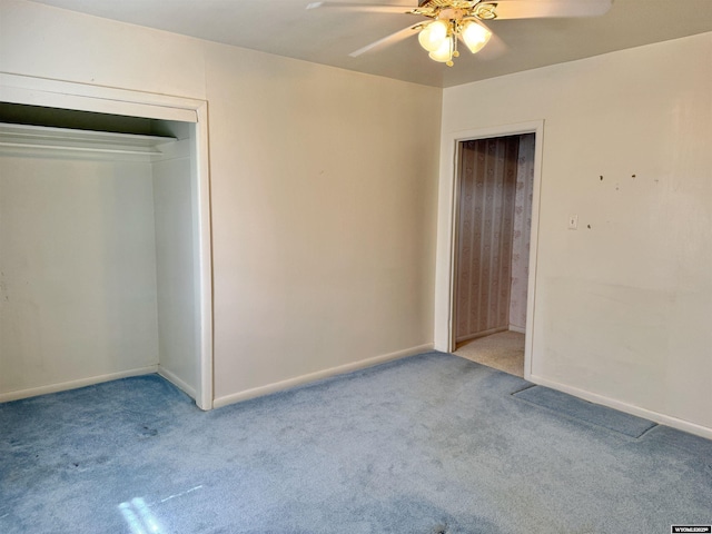 1101 Pine Ave, Kemmerer, WY 83101 - unfurnished bedroom with a closet, light carpet, a ceiling fan, and baseboards