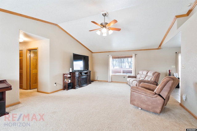 carpeted living room featuring crown molding, ceiling fan, and vaulted ceiling