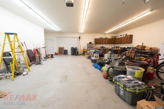 garage featuring a garage door opener