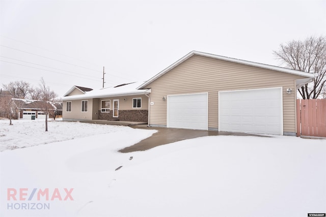 ranch-style home with a garage