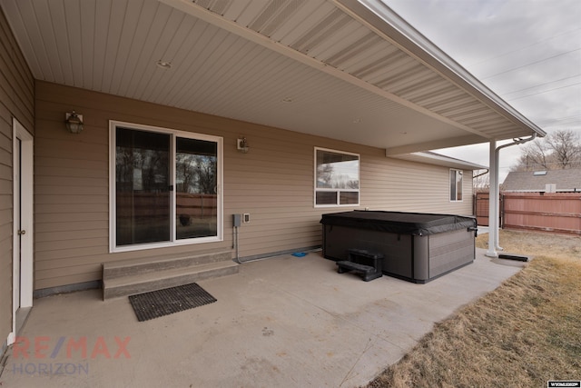 view of patio with a hot tub