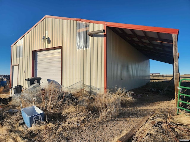 view of outbuilding featuring a garage