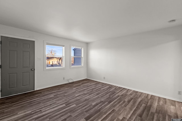 interior space with dark hardwood / wood-style floors