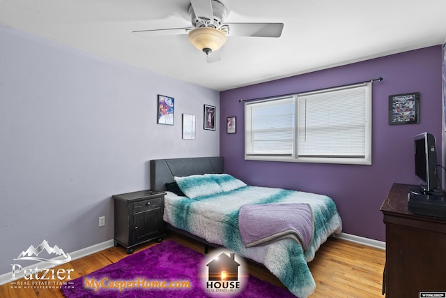 bedroom featuring ceiling fan and light hardwood / wood-style flooring