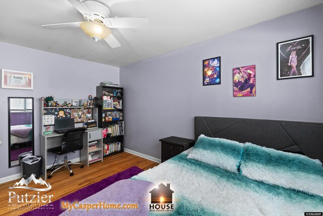 bedroom featuring wood-type flooring and ceiling fan