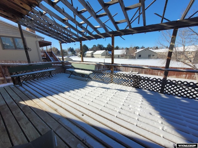 view of snow covered deck