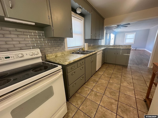 kitchen with white appliances, sink, ceiling fan, light tile patterned floors, and gray cabinetry