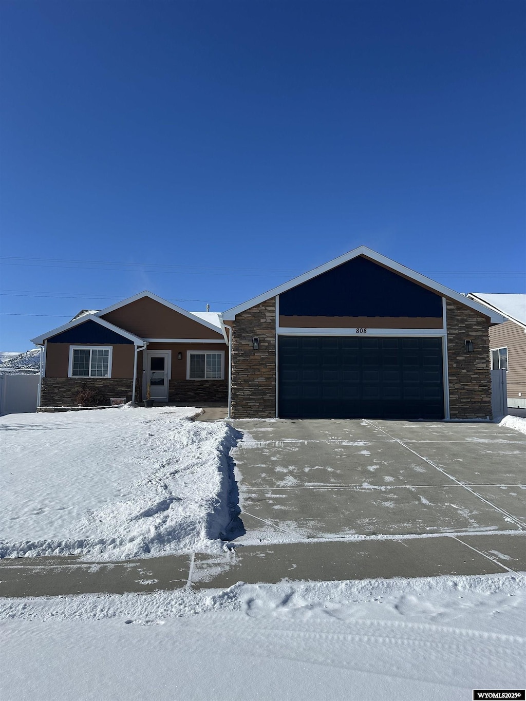 ranch-style home with a garage