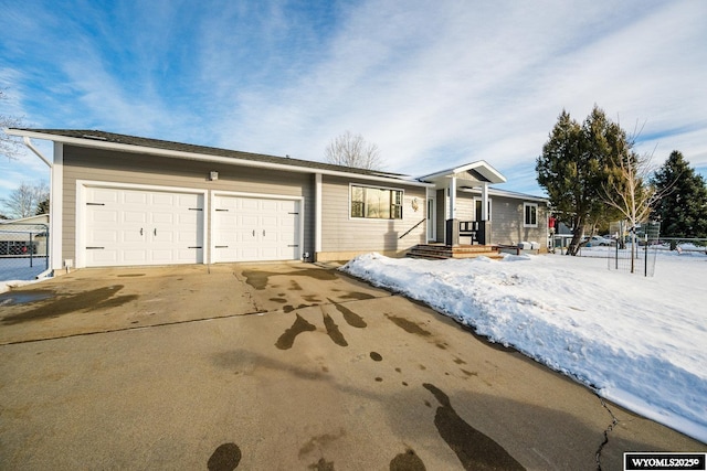 ranch-style home with a garage