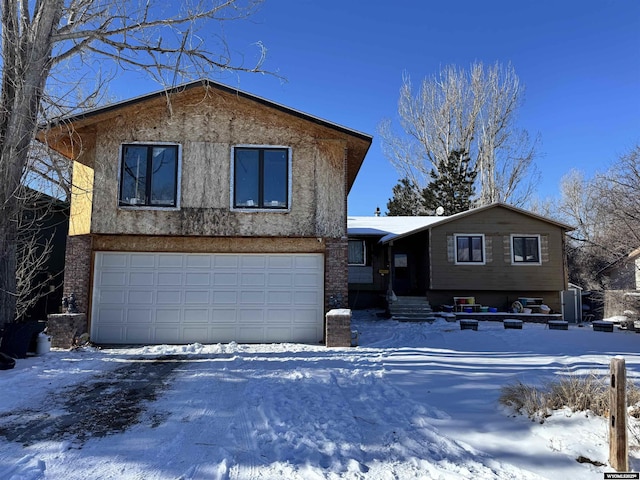 split level home with a garage