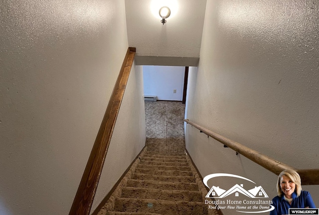 staircase featuring a baseboard radiator