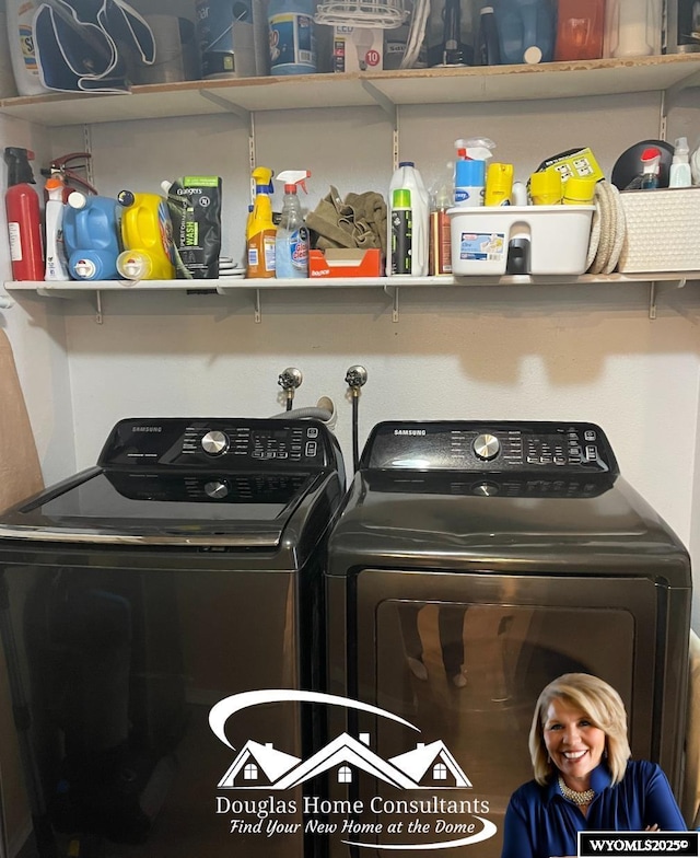 clothes washing area with separate washer and dryer