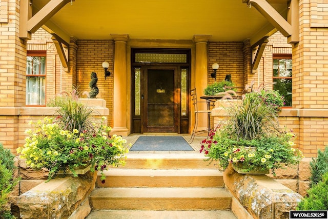 entrance to property with a porch