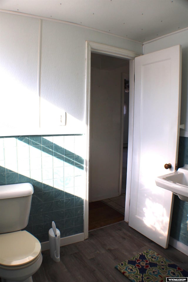 925 Jefferson Ave, Rock Springs, WY 82901 - bathroom featuring wood-type flooring and toilet
