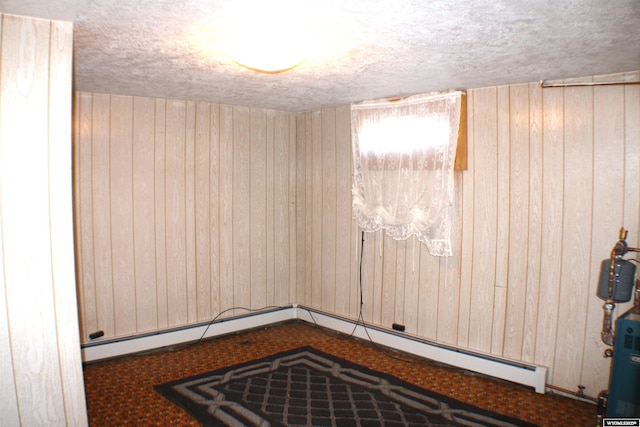 925 Jefferson Ave, Rock Springs, WY 82901 - unfurnished room with a textured ceiling and wood walls