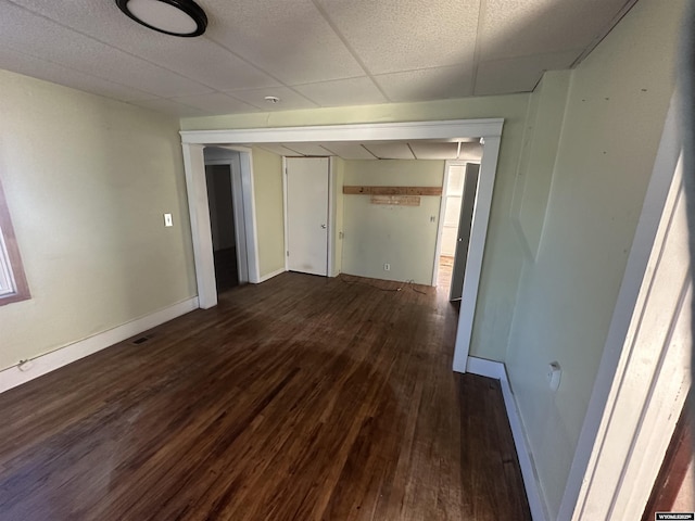 unfurnished room featuring dark hardwood / wood-style floors