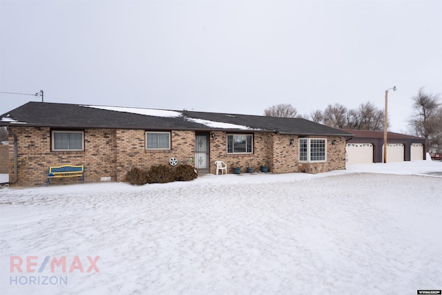 single story home featuring a garage