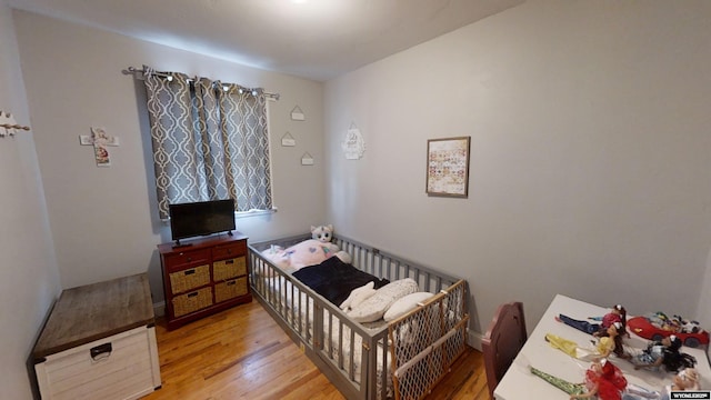 bedroom featuring light hardwood / wood-style floors