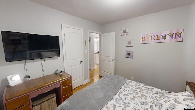 bedroom with light hardwood / wood-style floors