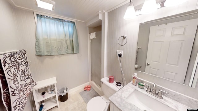 bathroom featuring vanity, an enclosed shower, and toilet