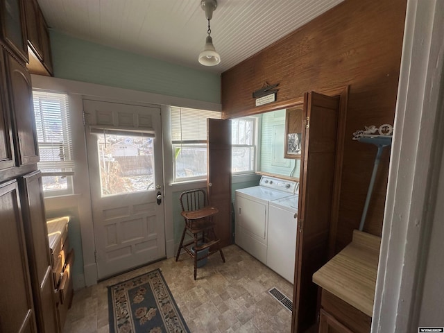 laundry room featuring washer and clothes dryer