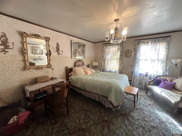 bedroom with an inviting chandelier and crown molding