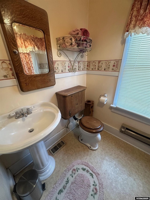 bathroom featuring toilet