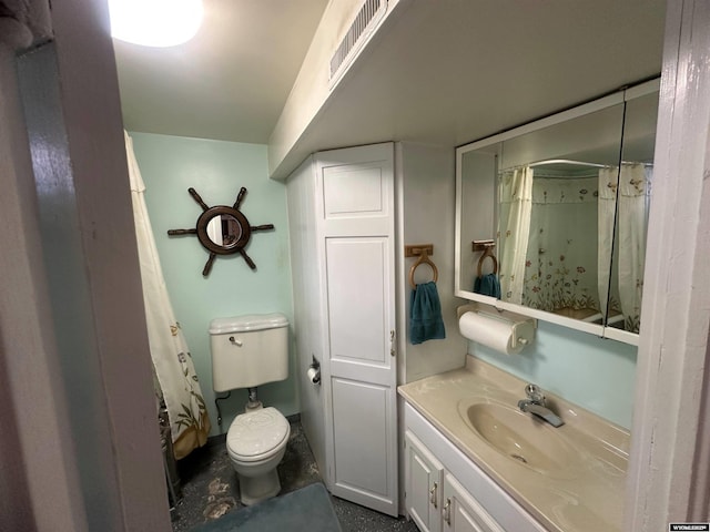 bathroom with vanity, toilet, and a shower with shower curtain