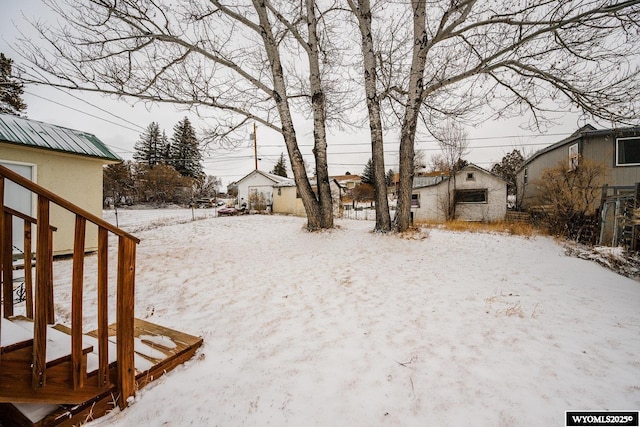 view of yard covered in snow