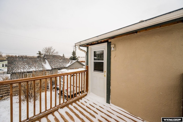 view of snow covered deck