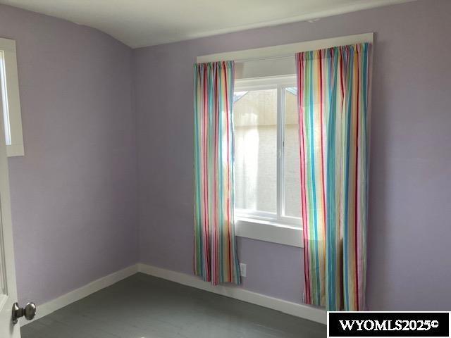 spare room featuring plenty of natural light